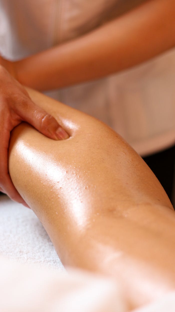 Mastering the First Impression: Your intriguing post title goes here Close-up of a relaxing leg massage in a spa, highlighting wellness and relaxation.