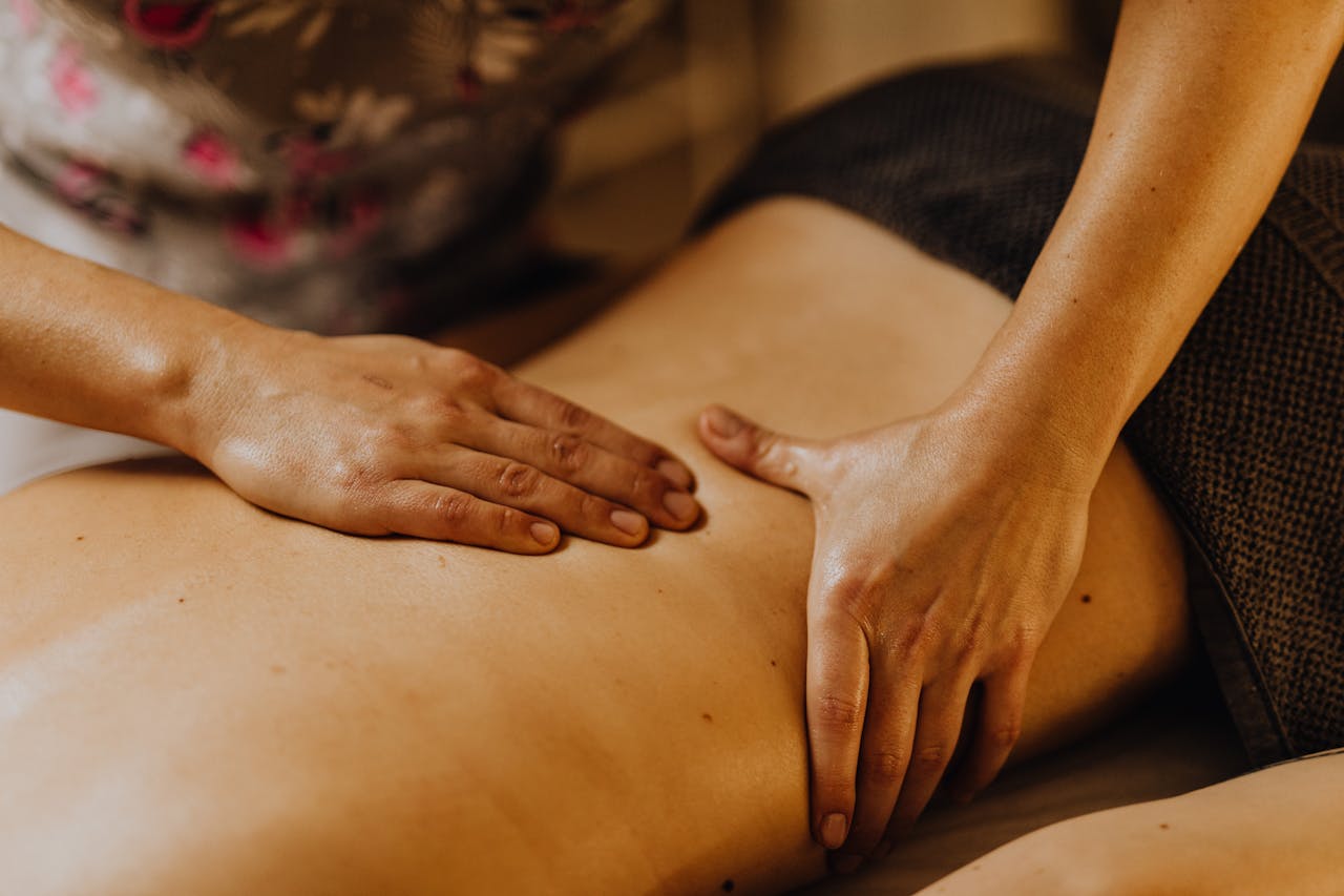 Crafting Captivating Headlines: Your awesome post title goes here Close-up of hands giving a soothing back massage in a calm atmosphere.